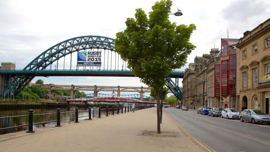 Caption: Majestic View Of Tyne Bridge At Sunset, Newcastle Upon Tyne, Uk Wallpaper