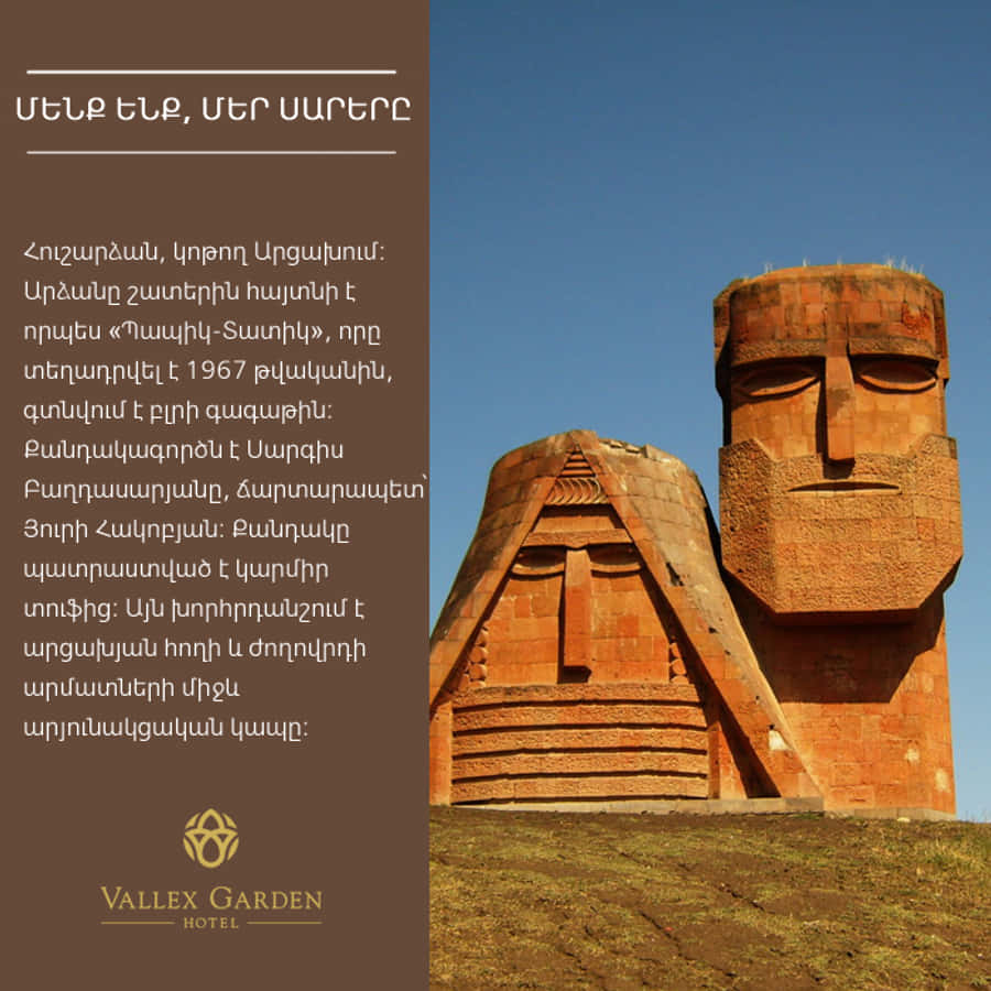 Caption: Majestic View Of We Are Our Mountains Monument Wallpaper