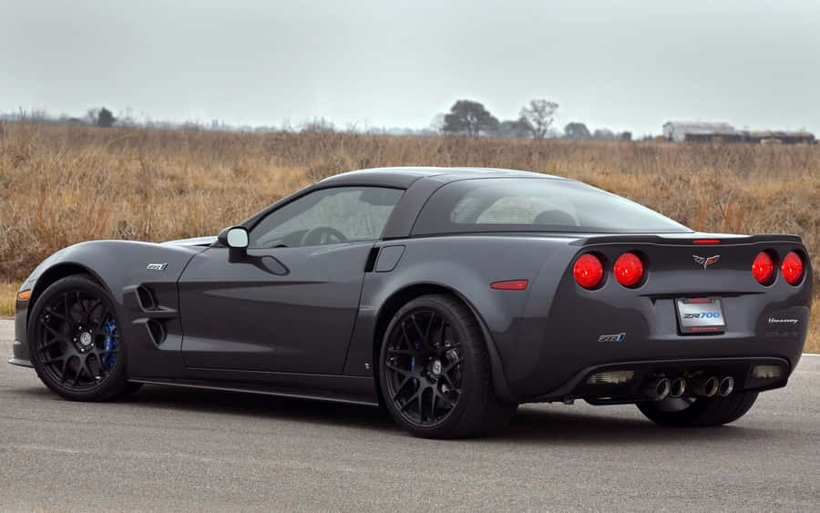 Caption: Mesmerizing Beauty Of Chevrolet Corvette Zr1 On A Midsummer Day. Wallpaper