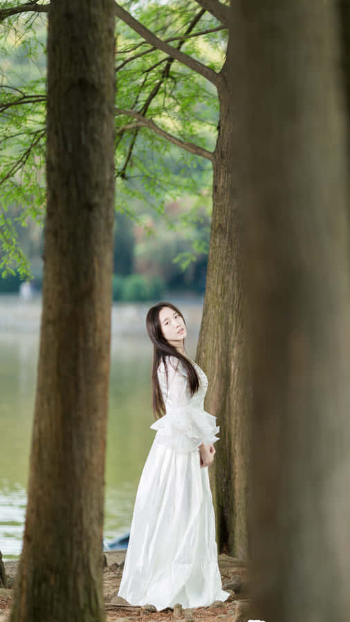 Caption: Mesmerizing Korean Beauty In A White Dress Wallpaper
