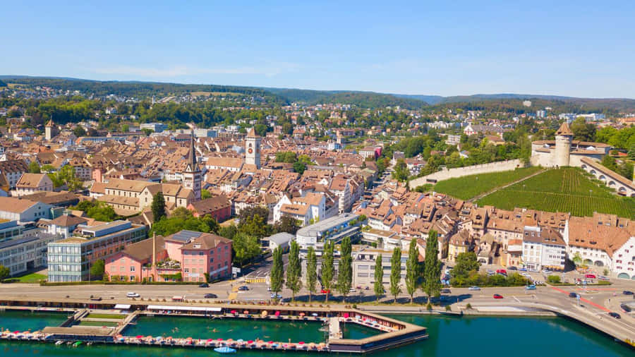 Caption: Rhine Falls In Schaffhausen, Switzerland Wallpaper