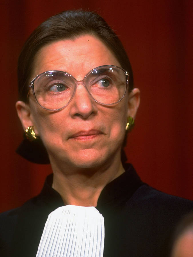Caption: Ruth Bader Ginsburg - Champion Of Equality And Justice Wallpaper