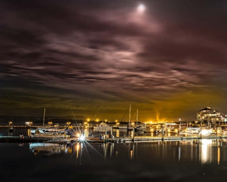 Caption: Scenic View Of Nanaimo Waterfront At Sunset Wallpaper