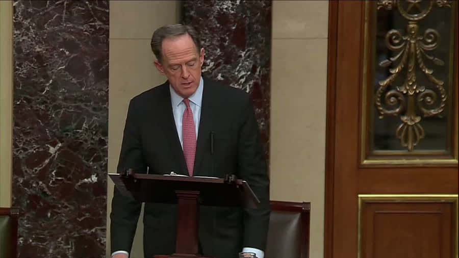 Caption: Senator Pat Toomey In Senate Chamber Wallpaper