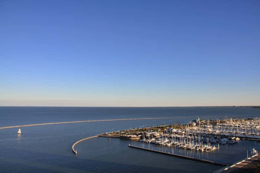 Caption: Serene Sunset Over The Corpus Christi Bayfront Wallpaper