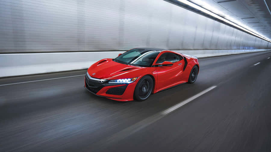 Caption: Sleek Acura Nsx With Vibrant Red Exterior Wallpaper
