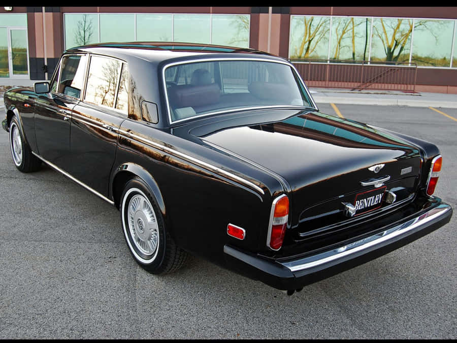 Caption: Sleek And Elegant Bentley T2 In Classic Design Wallpaper