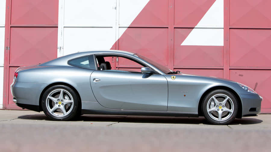Caption: Sleek And Luxurious Ferrari 612 Scaglietti In Action Wallpaper