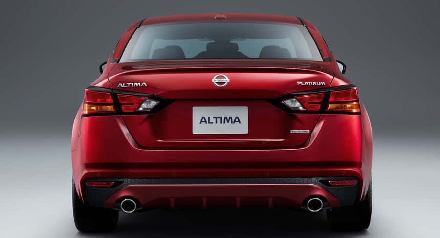Caption: Sleek And Sophisticated Nissan Altima Wallpaper
