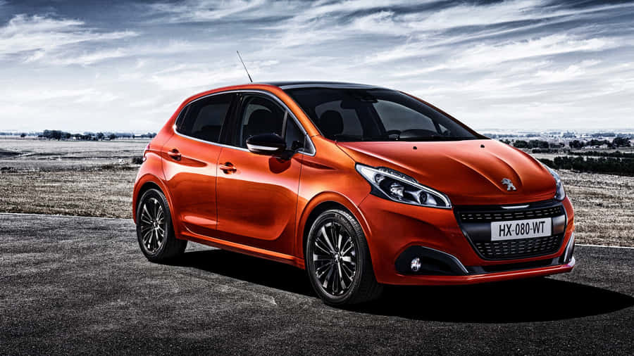 Caption: Sleek And Stylish Peugeot 208 In Action Wallpaper