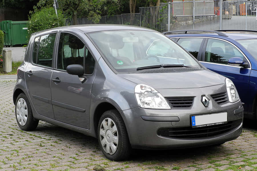 Caption: Sleek And Stylish Renault Modus In Action Wallpaper
