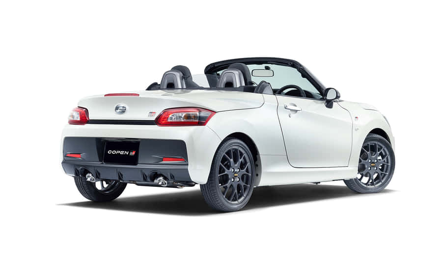 Caption: Sleek Daihatsu Copen Underneath The Blue Sky Wallpaper