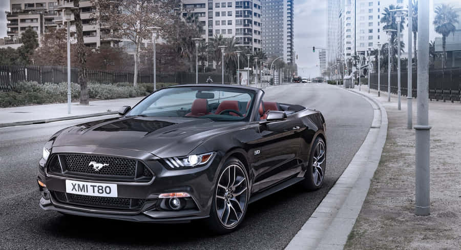 Caption: Sleek Ford Mustang Gt Convertible Wallpaper