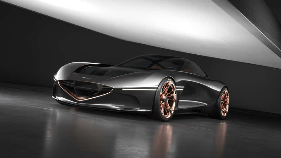 Caption: Sleek Genesis Essentia Concept Car On Display Wallpaper