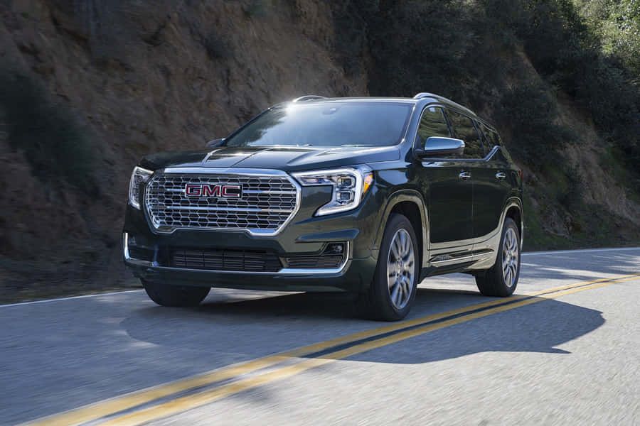 Caption: Sleek Gmc Terrain Cruising The Open Road Wallpaper