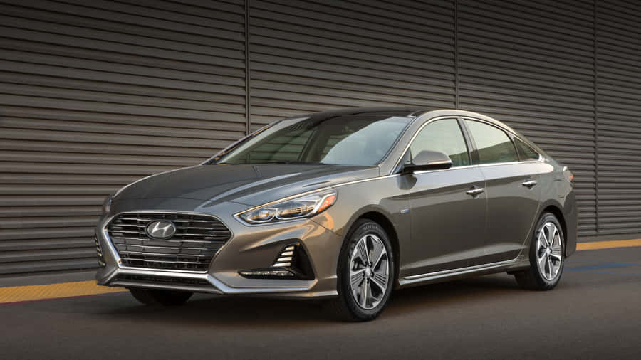 Caption: Sleek Hyundai Accent In Vibrant Surroundings Wallpaper