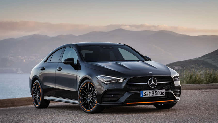 Caption: Sleek Mercedes Benz Cla-class In Action Wallpaper