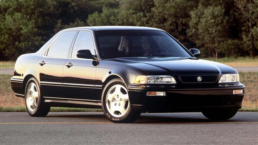 Caption: Sleek Silver Acura Legend In Motion Wallpaper