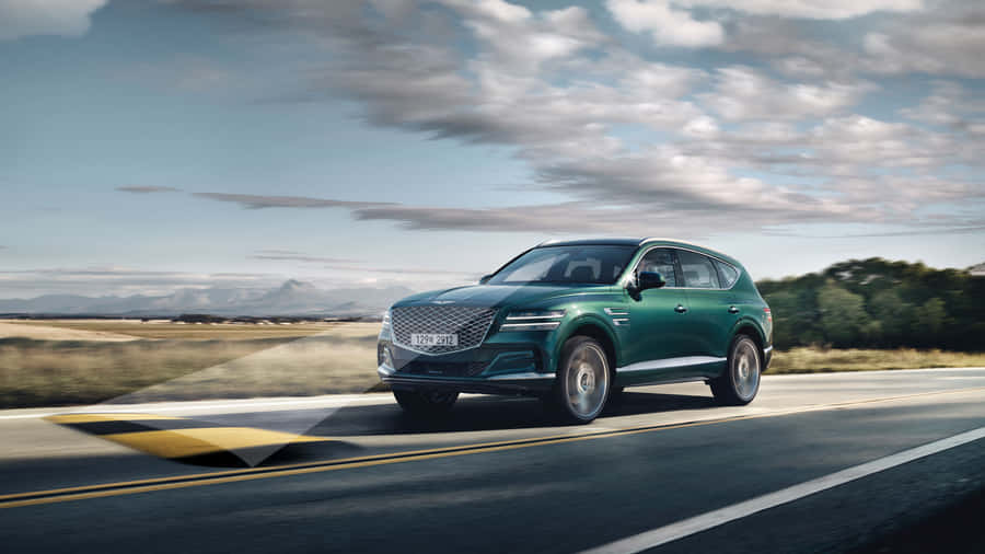 Caption: Striking Genesis Gv80 - The Ultimate Expression Of Luxury Suv Wallpaper