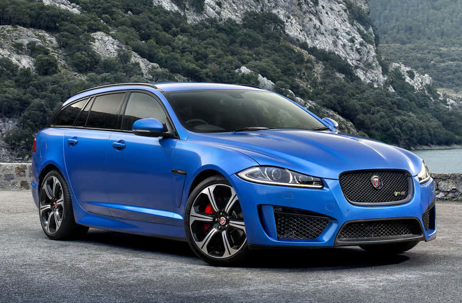 Caption: Striking Jaguar Xfr Luxury Sedan On The Move Wallpaper
