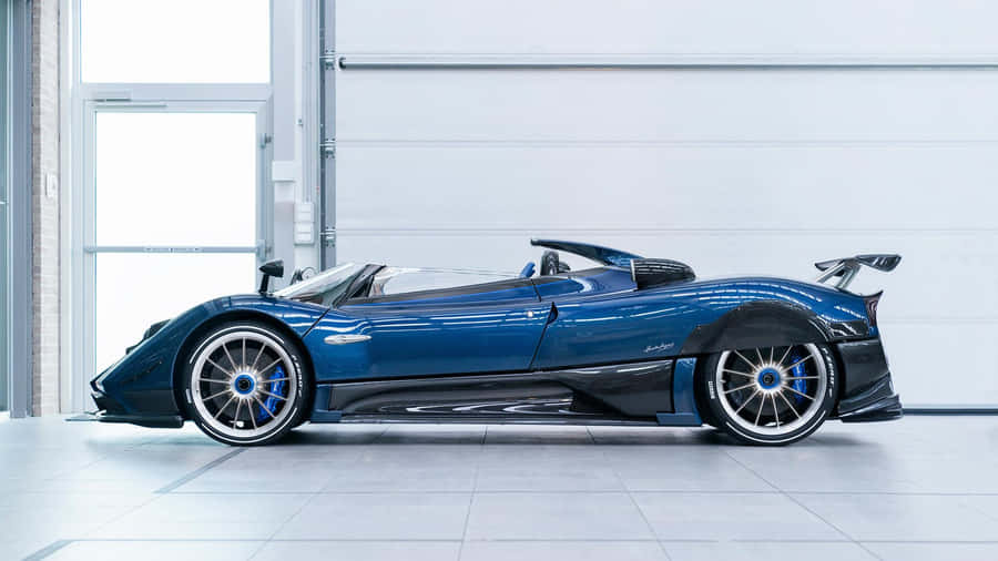 Caption: Striking Pagani Zonda Hp Barchetta In Motion Wallpaper