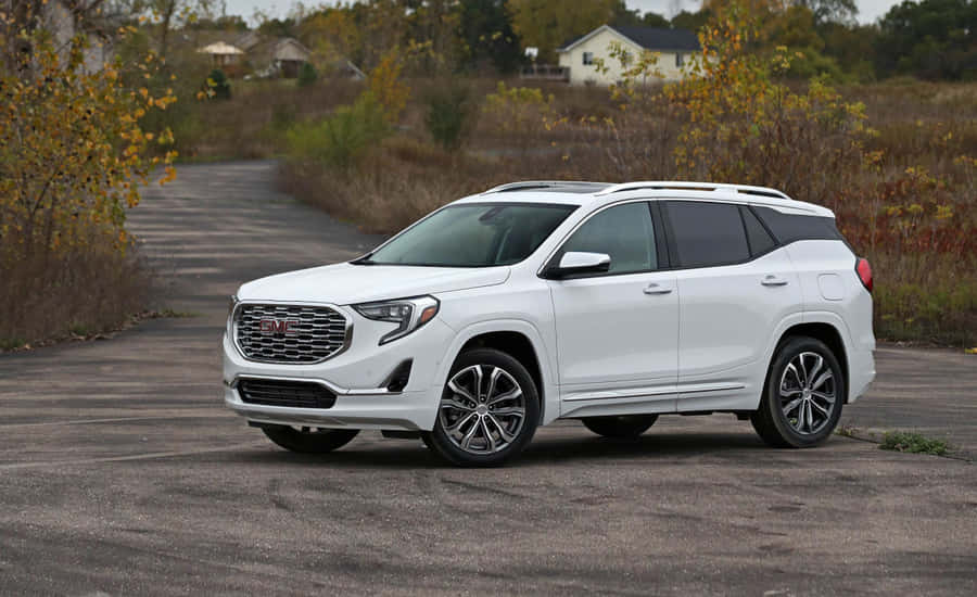 Caption: Stunning Gmc Terrain On A Scenic Route Wallpaper