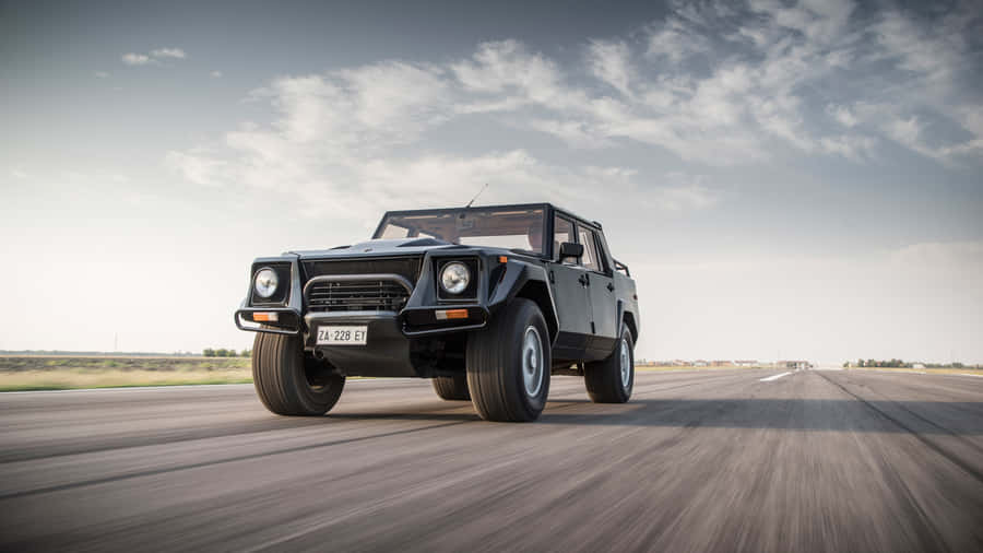 Caption: Stunning Lamborghini Lm002 In Its Full Glory Wallpaper