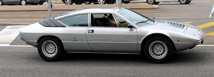 Caption: Stunning Lamborghini Urraco In Action Wallpaper
