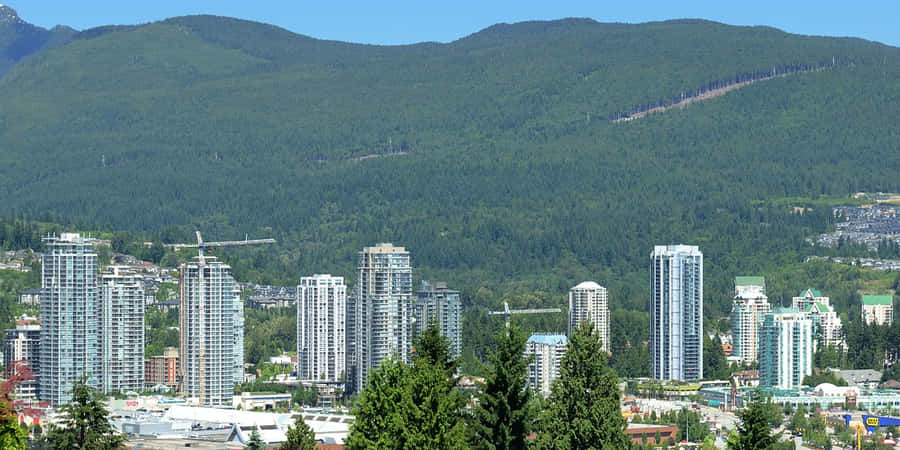 Caption: Stunning Landscape View Of Coquitlam Wallpaper