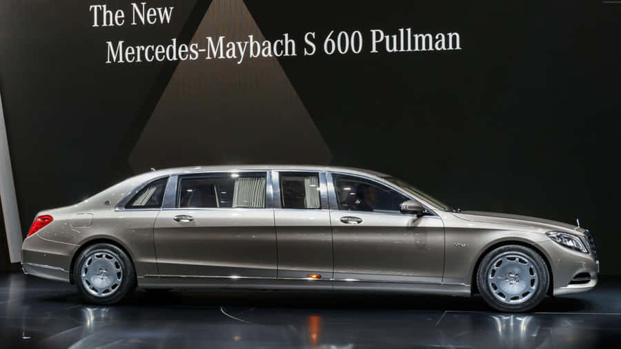 Caption: Stunning Maybach Luxury Car In Motion Wallpaper