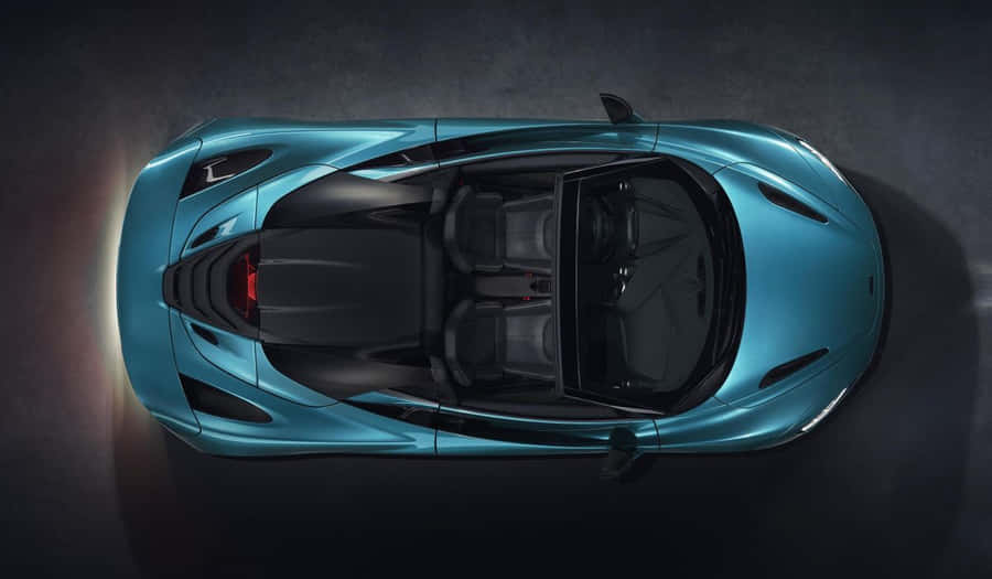 Caption: Stunning Mclaren 720s Spider In Full Speed Wallpaper