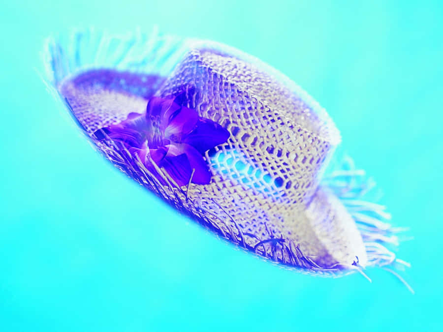 Caption: Stylish Beach Hat On The Perfect Sunny Day Wallpaper