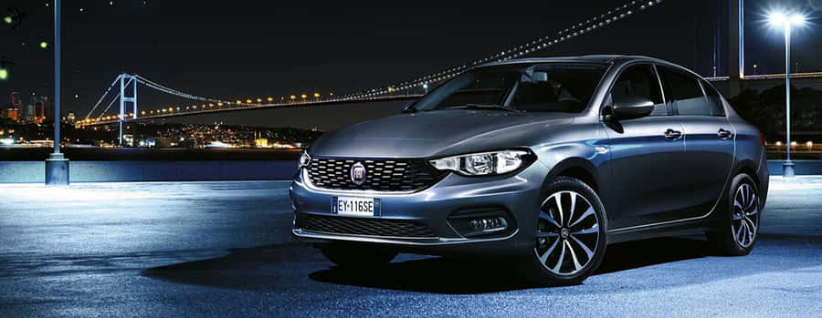 Caption: Stylish Fiat Tipo On The Road Wallpaper