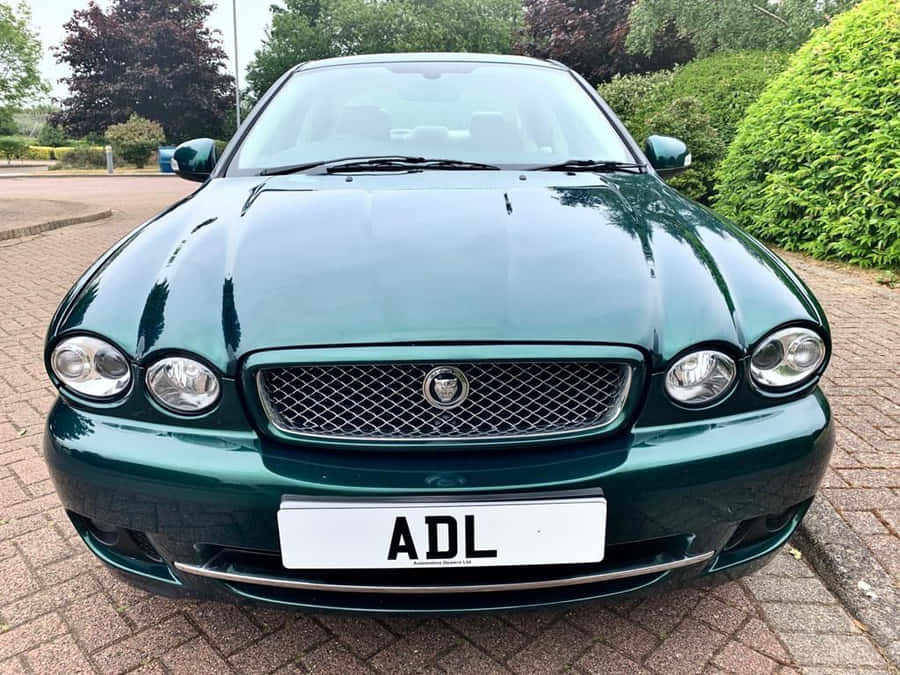 Caption: Stylish Jaguar X-type In Its Natural Habitat Wallpaper