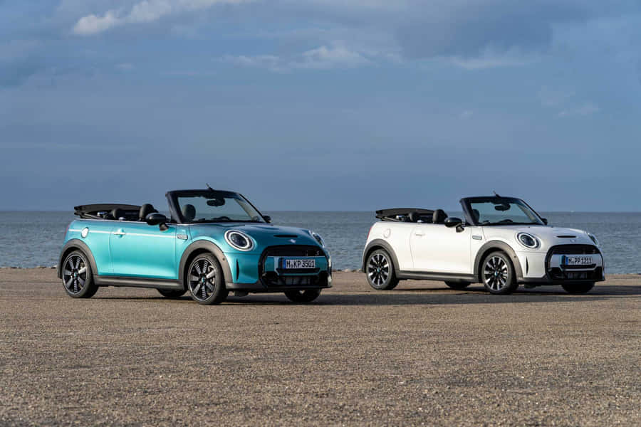 Caption: Stylish Mini Cooper S Convertible On An Open Road Wallpaper