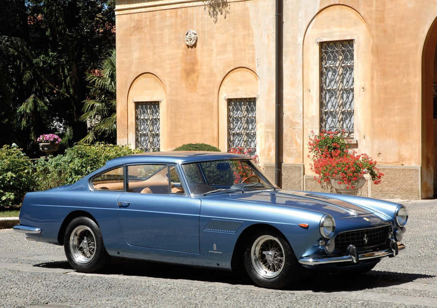 Caption: The Elegant Ferrari 330 Unleashing Power And Performance Wallpaper