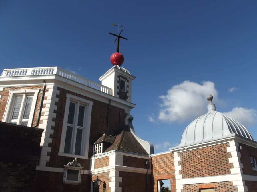 Caption: The Royal Observatory Under A Starlit Sky Wallpaper
