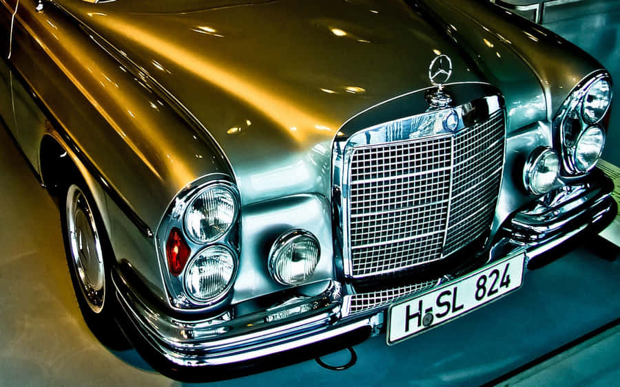 Caption: Timeless Elegance: An Old Mercedes Benz Car Wallpaper