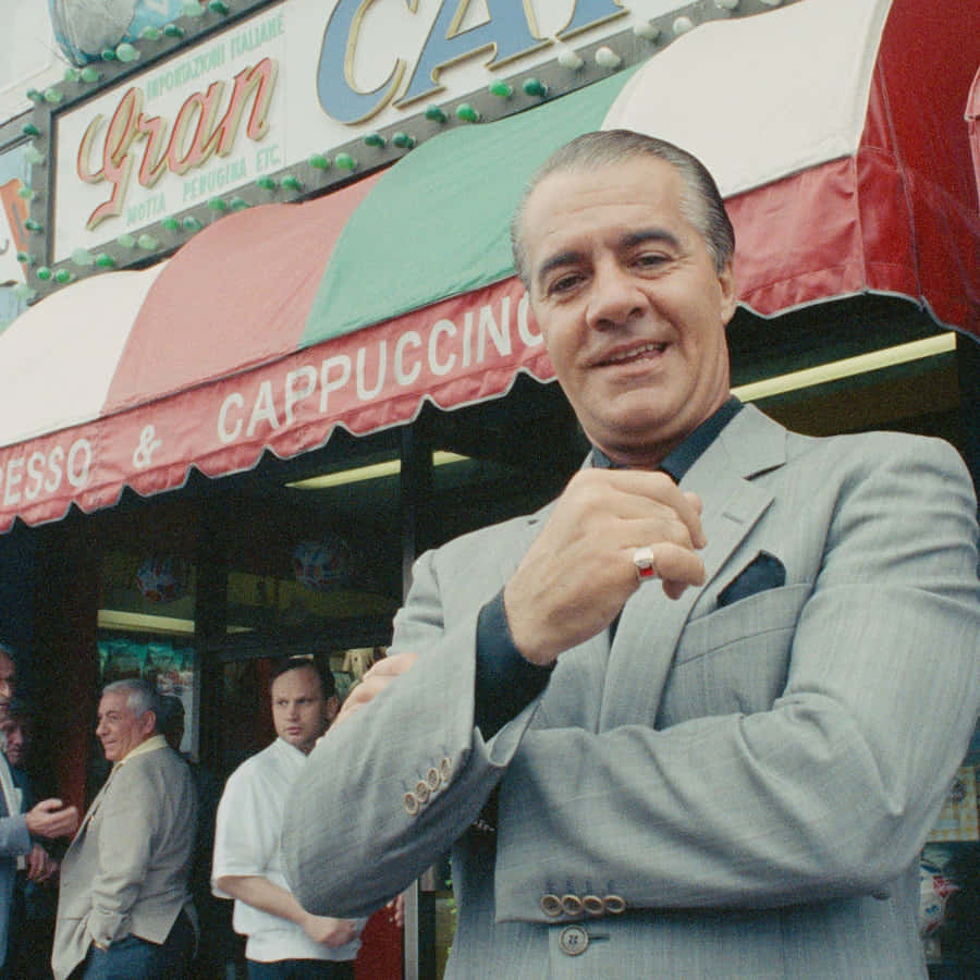 Caption: Tony Sirico Exudes Charisma In A Dapper Suit Wallpaper