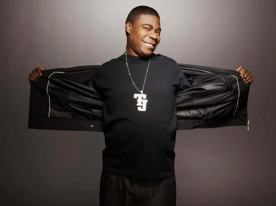 Caption: Tracy Morgan Striking A Confident Pose Wallpaper