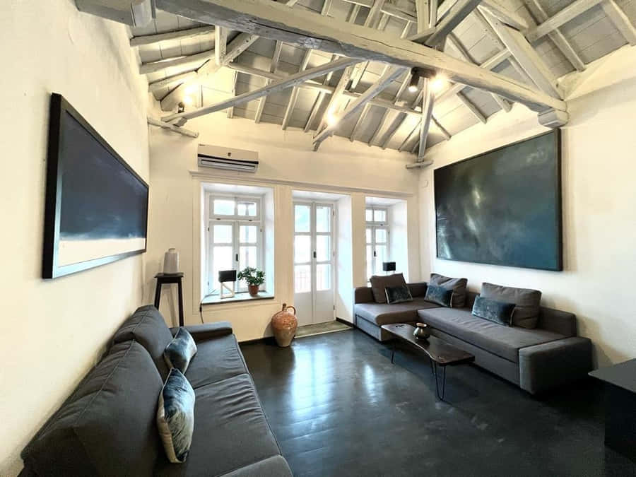 Caption: Tranquil Riverside House At Sunset Wallpaper