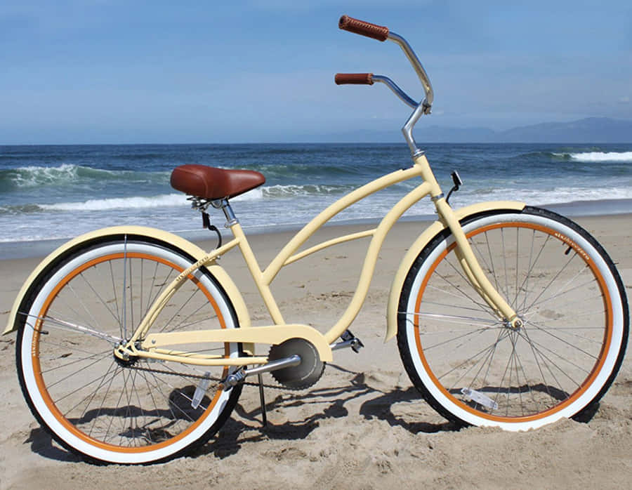 Caption: Vintage Beach Cruiser On A Beautiful Coastal Path Wallpaper