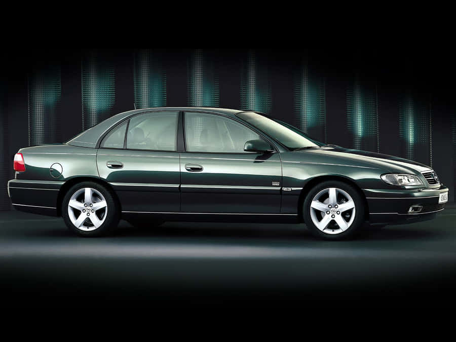 Caption: Vintage Opel Omega Roaring On The Highway Wallpaper