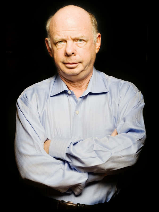 Caption: Wallace Shawn, Renowned Actor And Playwright, Posing For A Photoshoot. Wallpaper