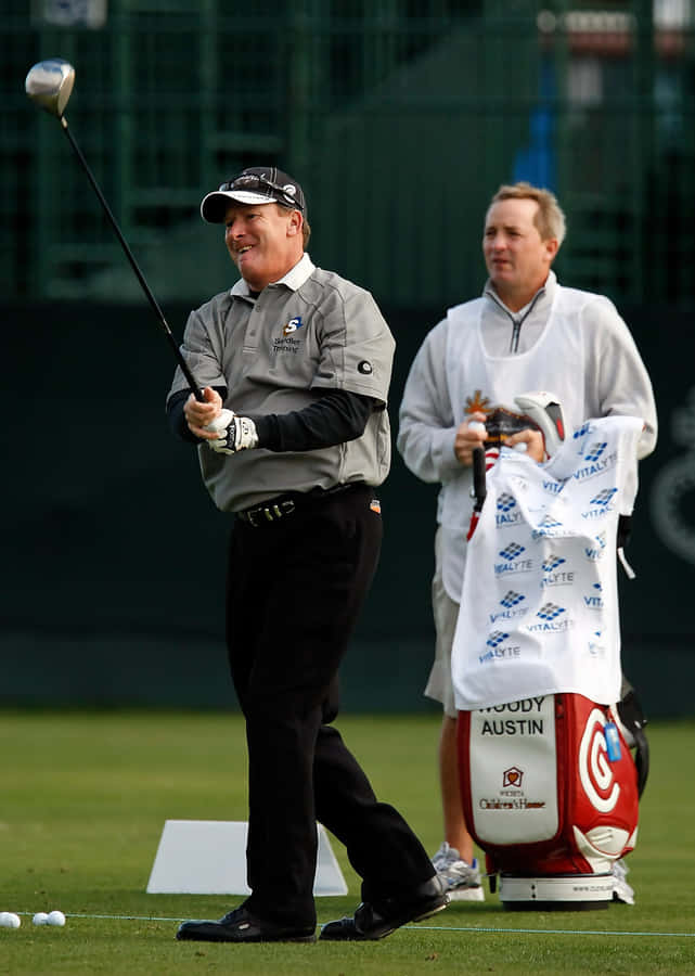 Caption: Woody Austin Perfecting His Swing Before A Match Wallpaper