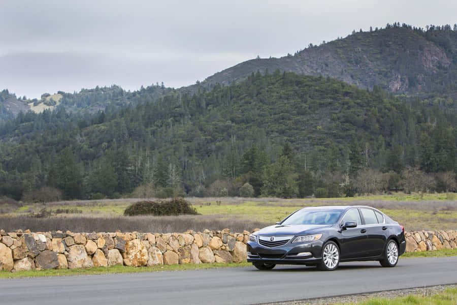 Captivating Acura Rlx In A Breathtaking Setting Wallpaper