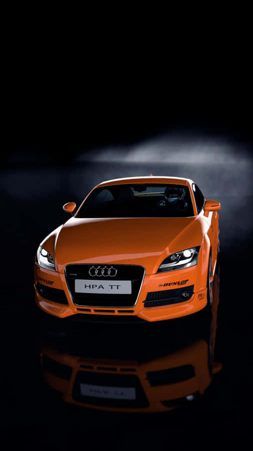 Captivating Audi Tt In Majestic Mountains Wallpaper
