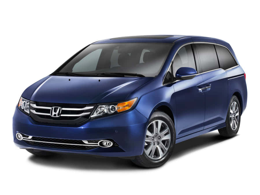 Captivating Honda Odyssey On A Scenic Road Wallpaper