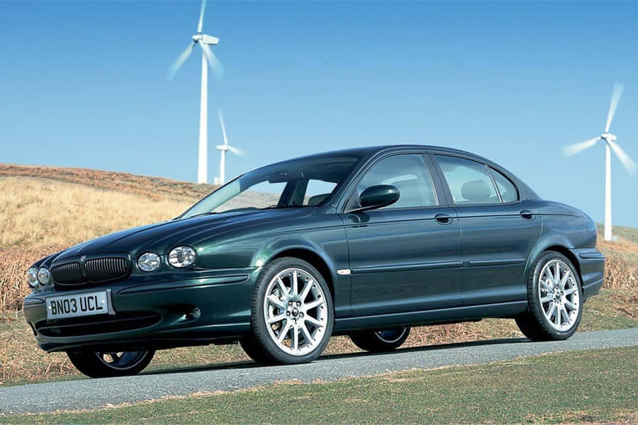 Captivating Jaguar X-type In Action Wallpaper