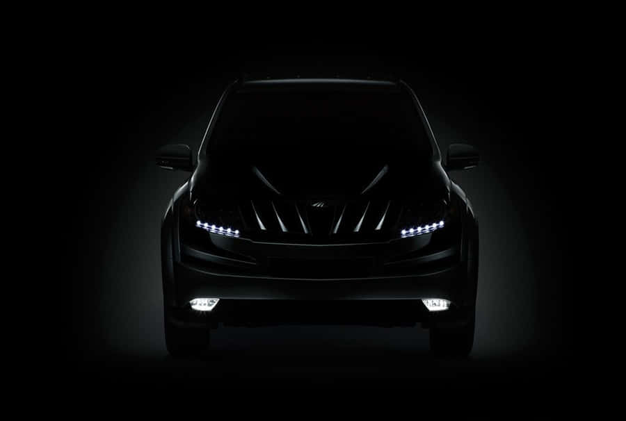 Captivating Mahindra Suv On A Scenic Adventure Wallpaper